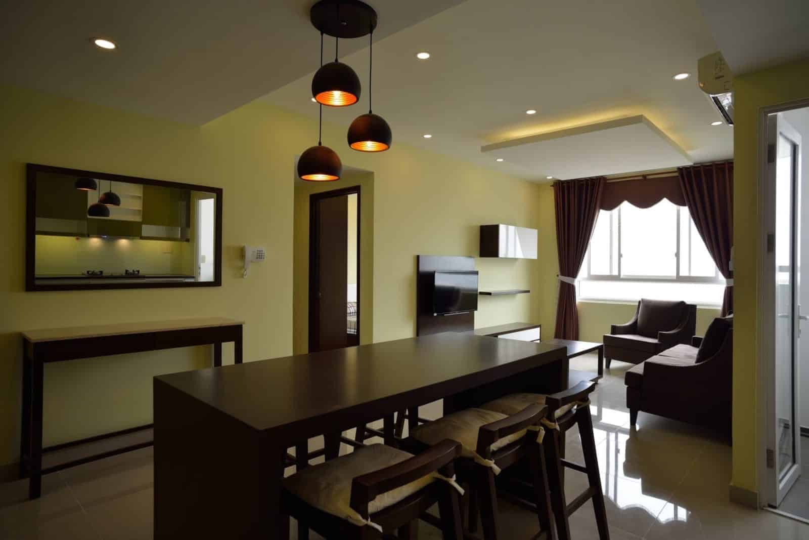 Tropic Garden Apartment For Rent With Cheap Rental And Dark Wooden Furniture