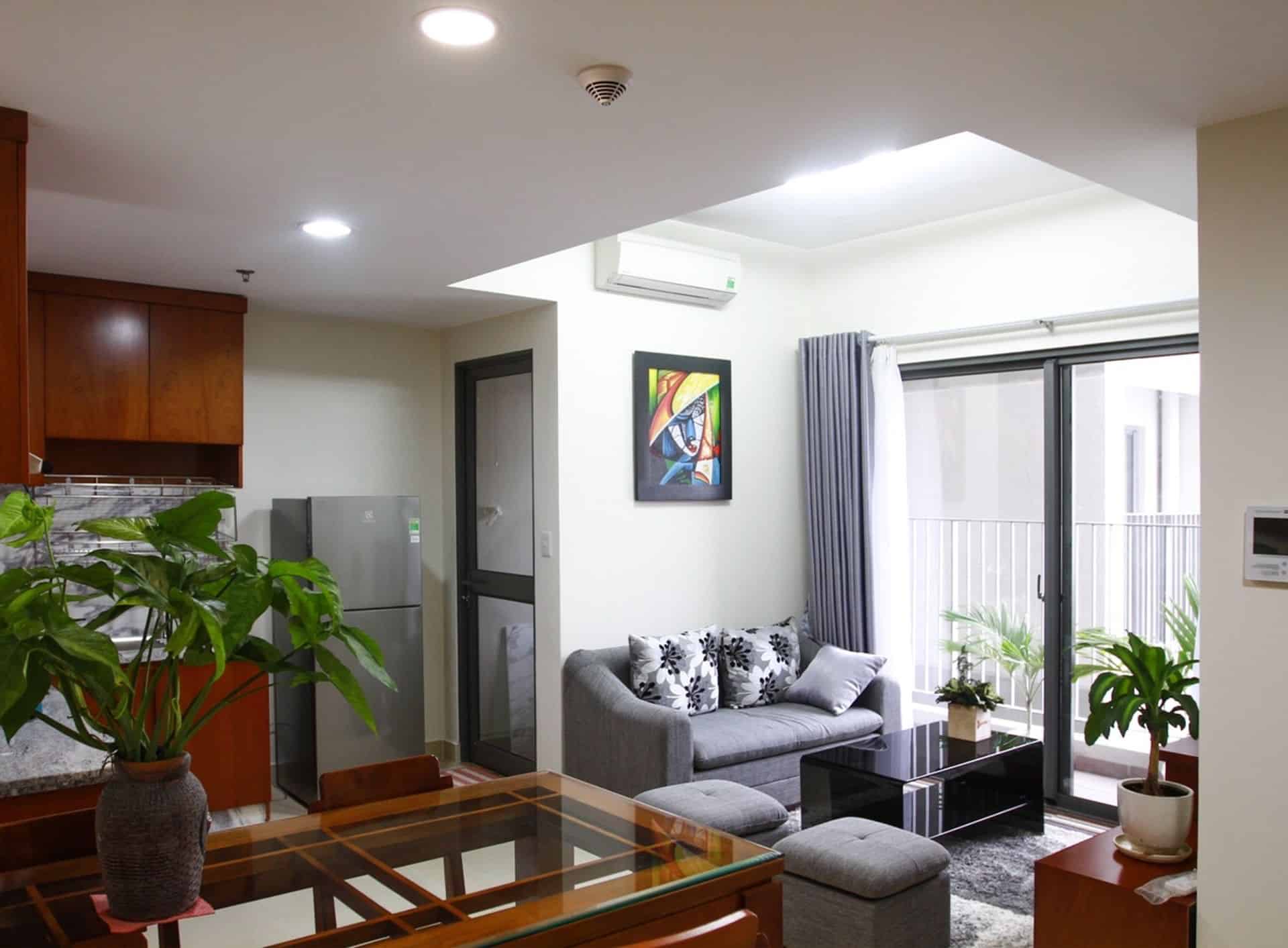 Dominant Wood Tone Apartment In Masteri Thao Dien